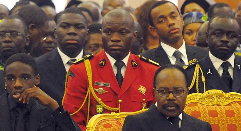 Omar Bongo Ondimba, Gabon s late President (R) and General Brice Oligui Nguema (2nd row C) attend the funeral of Gabon s first lady, Edith Lucie Bongo, in the Presidential Palace in Libreville on March 19, 2009. AFP