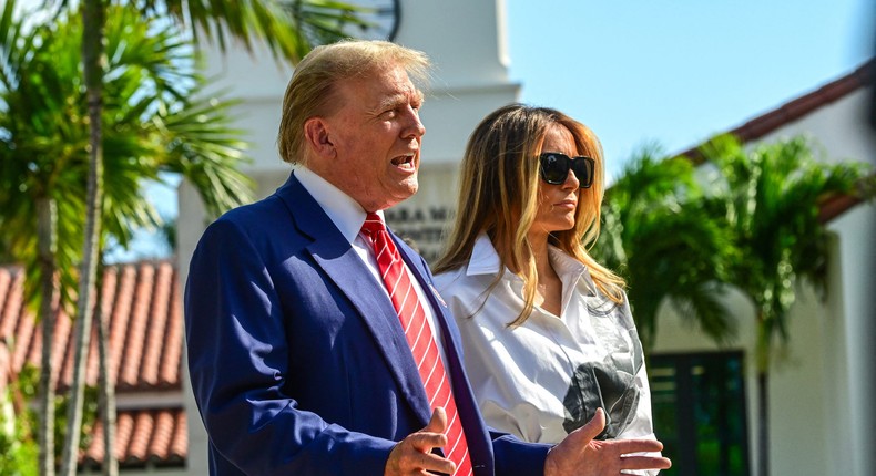 Former President Donald Trump speaks alongside his wife, former first lady Melania Trump, during a rare joint appearance as they arrived to vote in Florida's primary election.Giorgio Viera/AFP/Getty Images