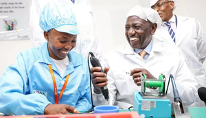 President William Ruto is shown how the smart phones are made at the East Africa Device Assembly Kenya factory in Athi River, Machakos during its launch on October 30, 2023.