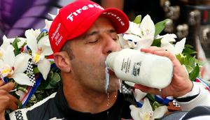 Driver Tony Kanaan of Brazil takes the traditional drink of milk after winning the 97th running of the Indianapolis 500 at the Indianapolis Motor Speedway.Jeff Haynes/Reuters