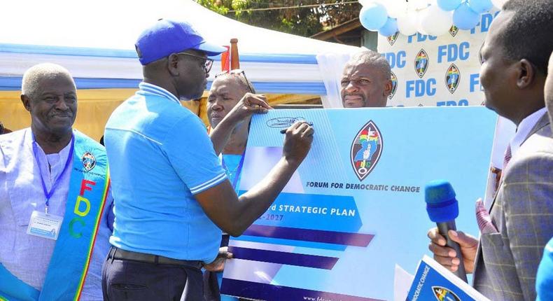 FDC President Patrick Oboi Amuriat signs off party's third strategic  plan at headquarters in Najjanankumbi on Friday November 25, 2022.