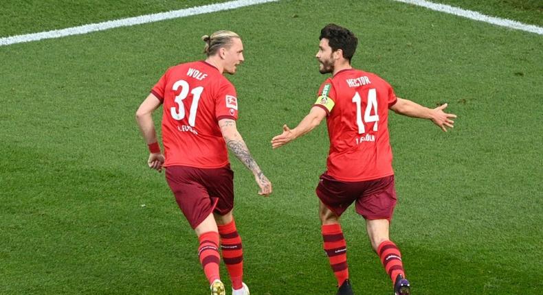 Cologne captain Jonas Hector (R) celebrates scoring the winning goal at home to RB Leipzig