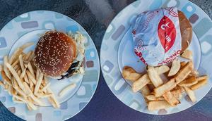 I order cheeseburgers and fries from McDonald's (left) and Red Robin (right).Meredith Schneider