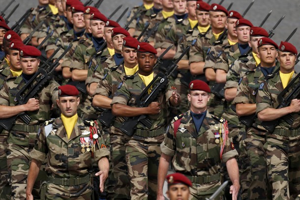 Troops from Operation Sangaris attend the Bastille Day military parade on the Champs-Elysees in Pari