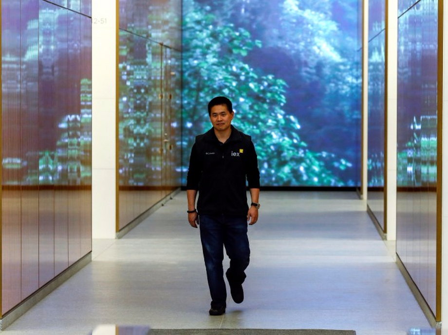Katsuyama, chief executive of IEX Group, walks in the lobby of 4 World Trade Center in New York