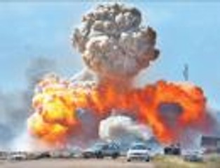 Świt Odysei, zmierzch tyrana Kaddafiego