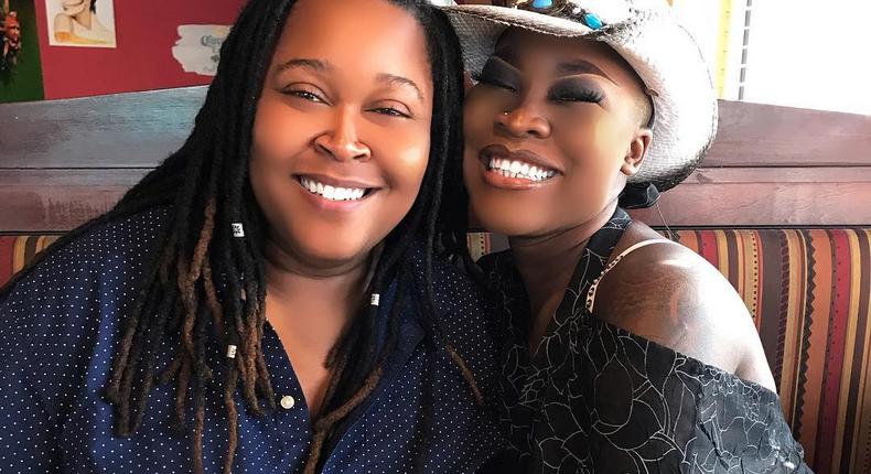 Charly Boy's daughter, Dewy Oputa obviously in the mood for the weekend shares some romantic photos with her female partner [Instagram/DewyAndSJ]