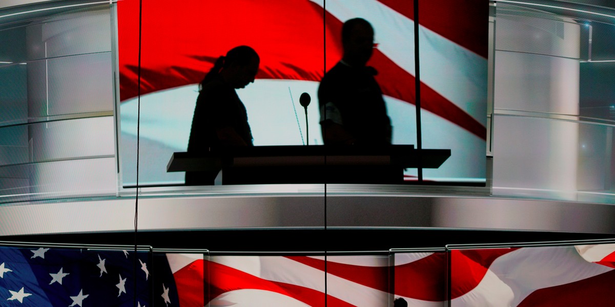 Workers assembling part of the convention stage inside the Quicken Loans Arena in Cleveland.