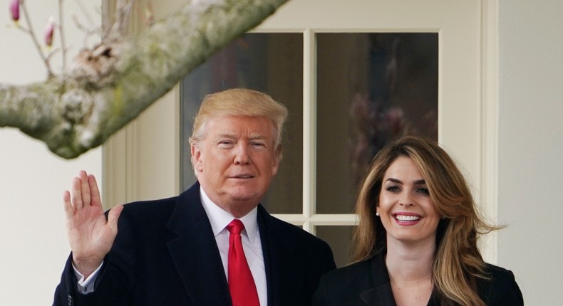 US President Donald Trump poses with former communications director Hope Hicks shortly before making his way to board Marine One on the South Lawn and departing from the White House on March 29, 2018.Mandel Ngan/AFP/Getty Images