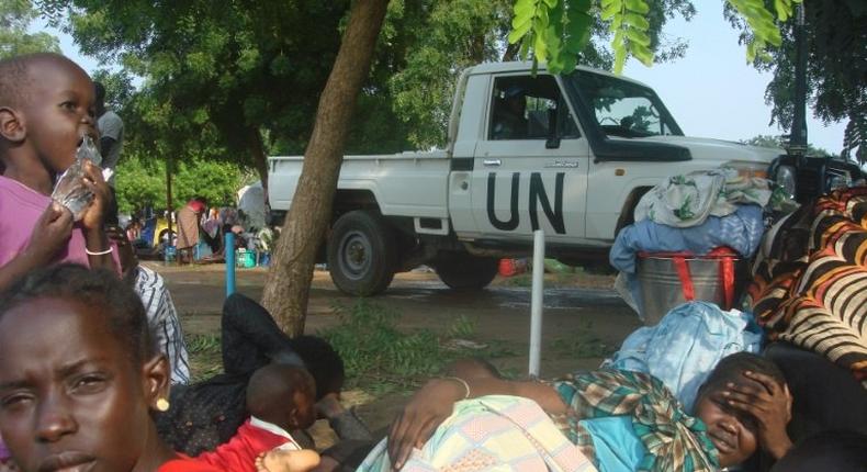 This image provided by UNMISS on July 11, 2016 shows displaced women, men and children taking shelter at the UN compound in Tomping area in Juba 