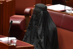 One Nation Leader Senator Pauline Hanson wears a full burqa at Parliament House in Canberra