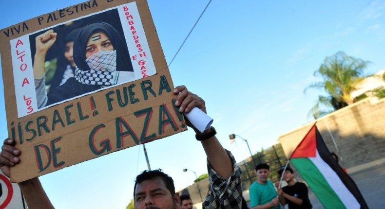 A group of pro-Palestinian demonstrators protest in front of the US embassy in Managua to demand an end to the Israeli attacks on the Gaza Strip, on November 19, 2012