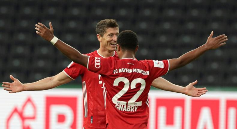 Bayern Munich striker Robert Lewandowski celebrates his long-range goal in the German Cup final win over Bayer Leverkusen on Saturday in Berlin.