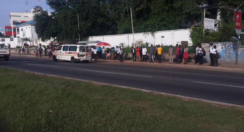 Some of the passengers stranded at Shangri-la bus stop in Accra