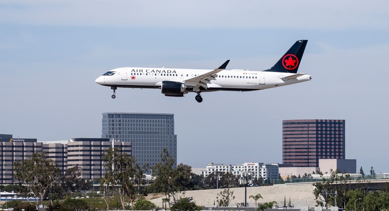 An Air Canada jet lands at John Wayne Airport in Santa Ana, CA on Tuesday, March 15, 2022.