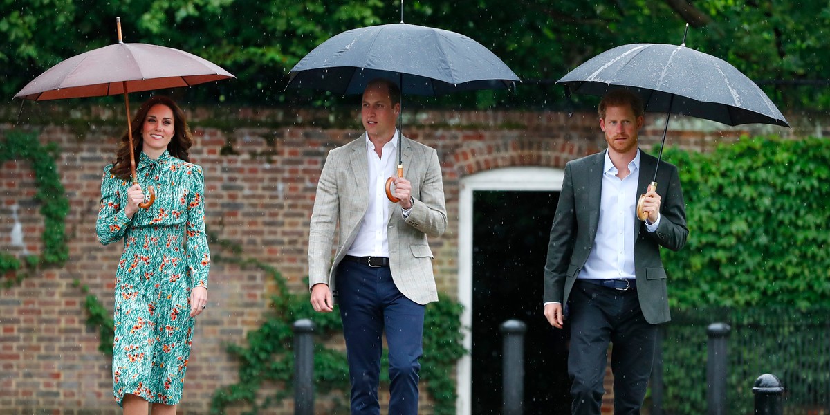 The trio tour the memorial garden.