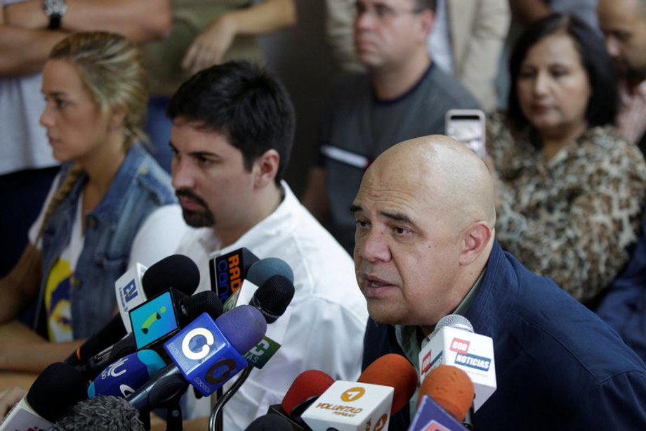 Jesus Torrealba right, secretary of Venezuela's opposition coalition (MUD), talks to the media at a news conference in Caracas, November 2, 2016.