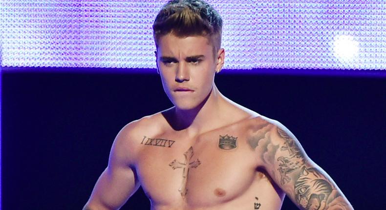 Justin Bieber showing off his bare torso 