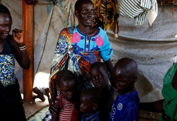 The Wider Image: Mother reunited with children after five-year search