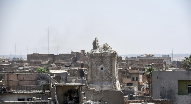A picture taken on June 25, 2017 shows Mosul's destroyed ancient leaning minaret, known as the Hadba (Hunchback), in the Old City after being blown up by Islamic State group fighters