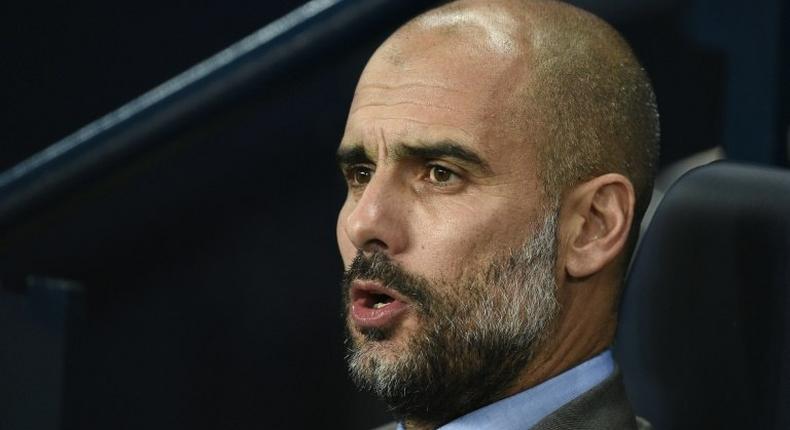 Manchester City manager Pep Guardiola watches his side take on Barcelona in the Champions League at the Etihad Stadium on November 1, 2016