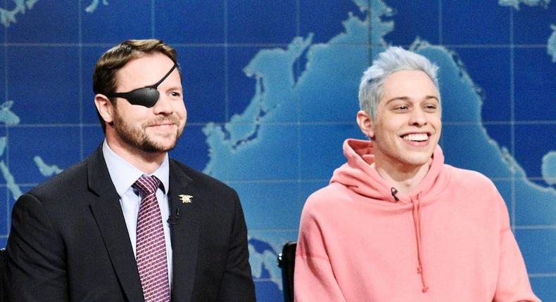 'Liev Schreiber' Episode 1751 -- Pictured: (l-r) Congressman-elect & Navy Veteran Dan Crenshaw, Pete Davidson, and Anchor Colin Jost during 'Weekend Update' in Studio 8H on Saturday, November 10, 2018 -- (Photo by: Will Heath/NBC/NBCU Photo Bank via Getty Images)