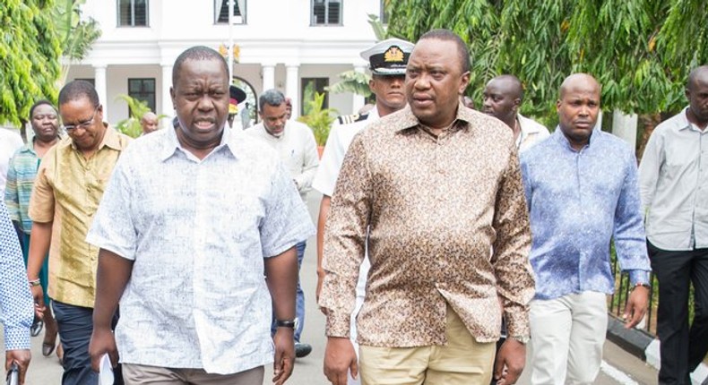 President Uhuru Kenyatta with CS Fred Matiang'i 