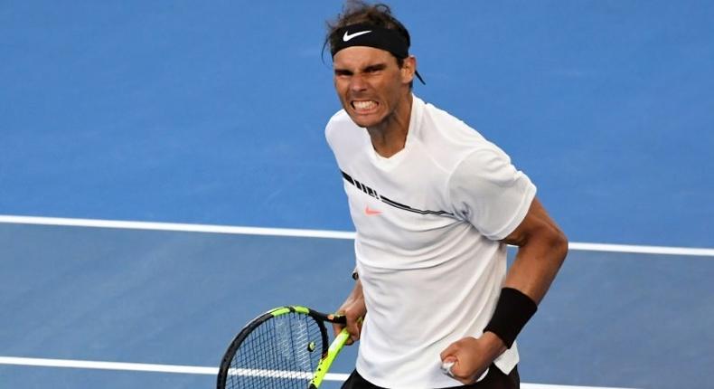 Spain's Rafael Nadal celebrates his victory over Russia's Alexander Zverev in their men's singles third round match on day six of the Australian Open tennis tournament in Melbourne on January 21, 2017