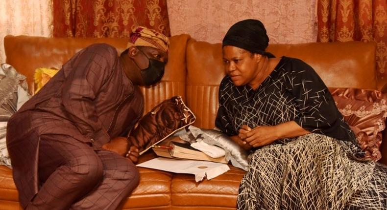 Commissioner for Home Affairs, Prince Anofiu Elegushi and the wife of the deceased, Evelyn Joshua. (Encomium)