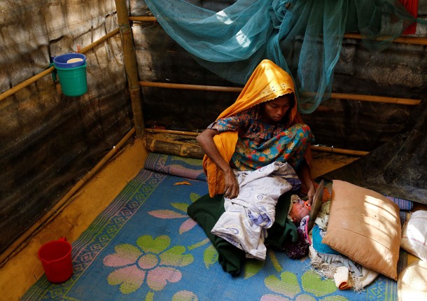 The Wider Image: Young Rohingya mothers flee persecution