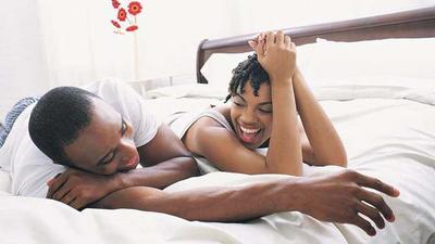 African couple in bed (Opinionated Male)