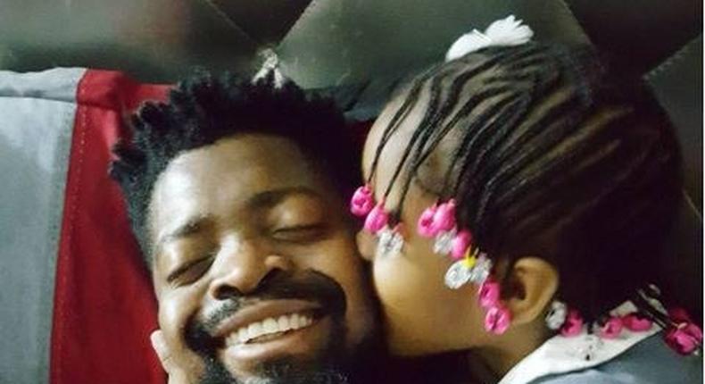 Basketmouth and his daughter.