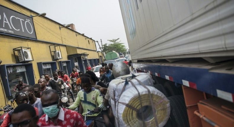 Commuters face a daily struggle to make their way through congested traffic in the port area of Lagos