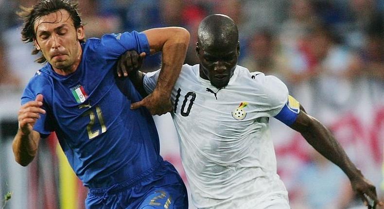 Andre Pirlo and Stephen Appiah