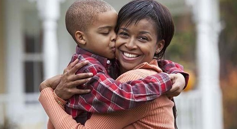 A Black woman and her son