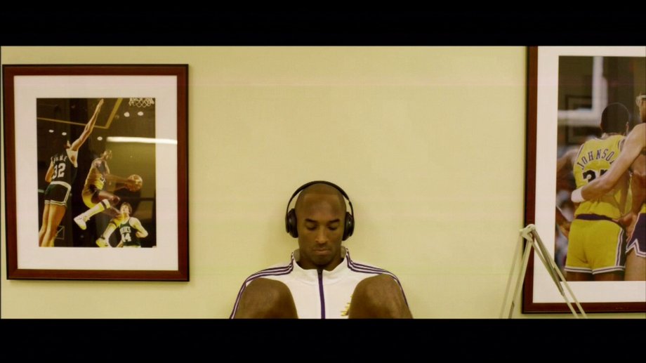 In the moments prior to playing in his first game following an Achilles's injury that would have ended the career of most, Kobe reflected between two photos of Magic Johnson.