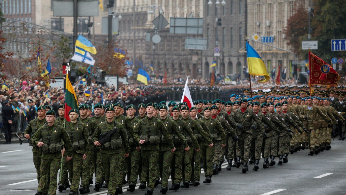 Servicemen of the Lithuanian-Polish-Ukrainian brigade march during Ukraine's Independence Day milita