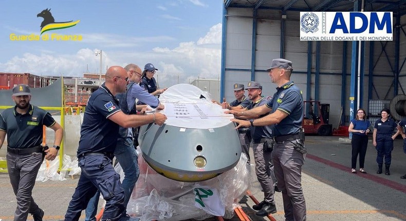 Italian officials uncover military drone parts disguised as wind turbine components.Guardia di Finanza