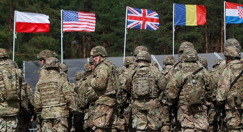 US troops, part of a NATO mission to enhance Poland's defense at a welcoming ceremony in Orzysz, northeastern Poland, April 13, 2017.