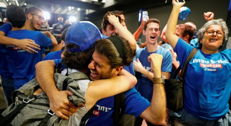 Supporters of Israeli politician Avi Gabbay celebrate after he was elected leader of Israel's main opposition Labour Party in the coastal city of Tel Aviv on July 10, 2017