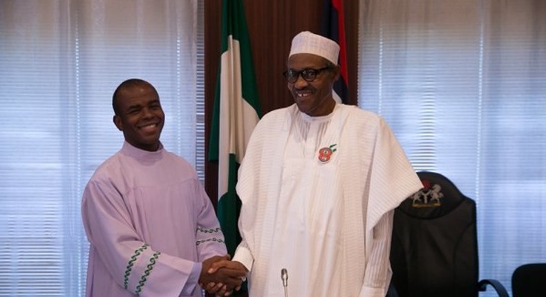 Rev. Fr. Ejike Mbaka and President Muhammadu Buhari.