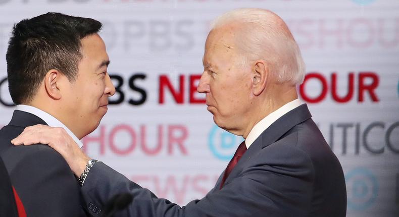 Andrew Yang and President Joe Biden during one of the 2020 Democratic presidential debates.
