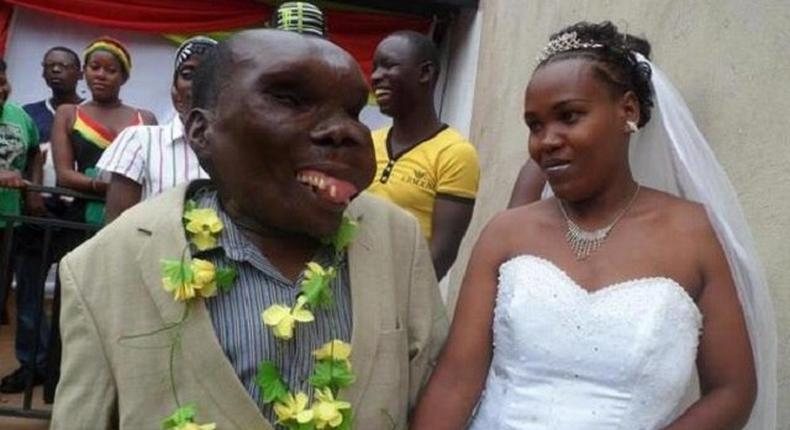 Godfrey Baguma and his bride on wedding day