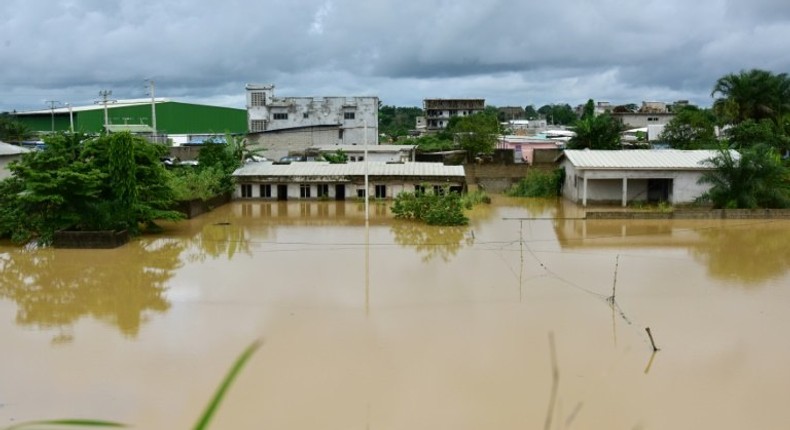 A picture shows a flooded area in a suburb of Abidjan following heavy rainfall in the Ivory Coast on June 13, 2017