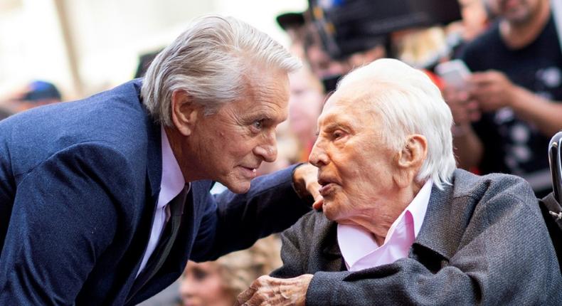 Kirk Douglas is survived by three sons, including the movie star Michael Douglas, pictured left with his father in 2018