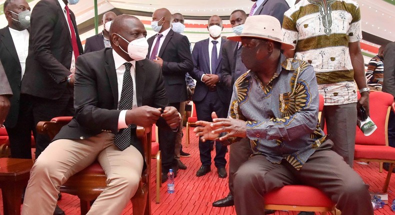 Deputy President William Ruto with former Prime Minister Raila Odinga