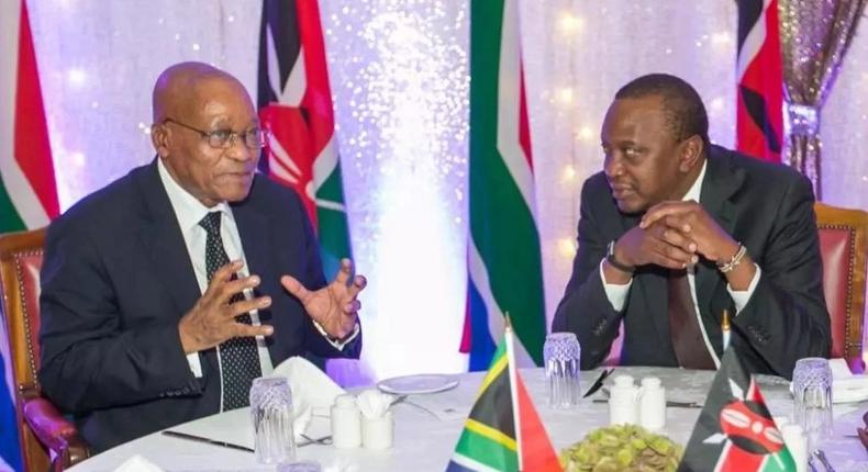 South Africa ex-president Jacob Zuma (L) with Kenyan President Uhuru Kenyatta (R)