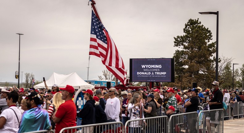 Attendees wait outside the Ford Wyoming Center before former President Donald Trump speaks on May 28, 2022 in Casper, Wyoming.