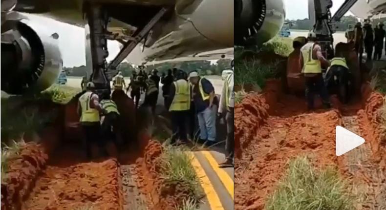 Airplane gets stuck in mud after skidding off the runway