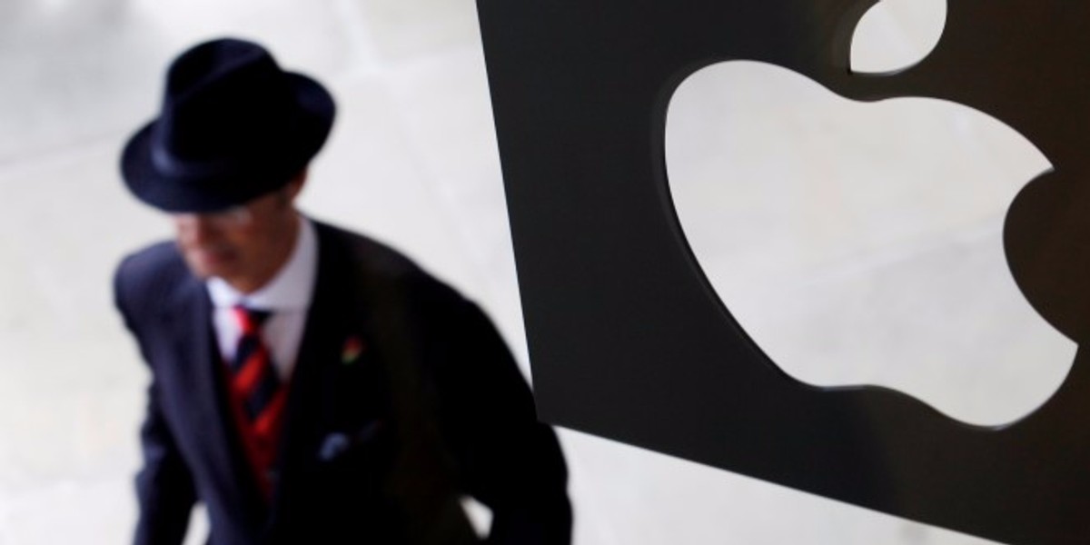 A customer enters the new Apple store, which is the world's largest, on its opening day at Covent Garden in London